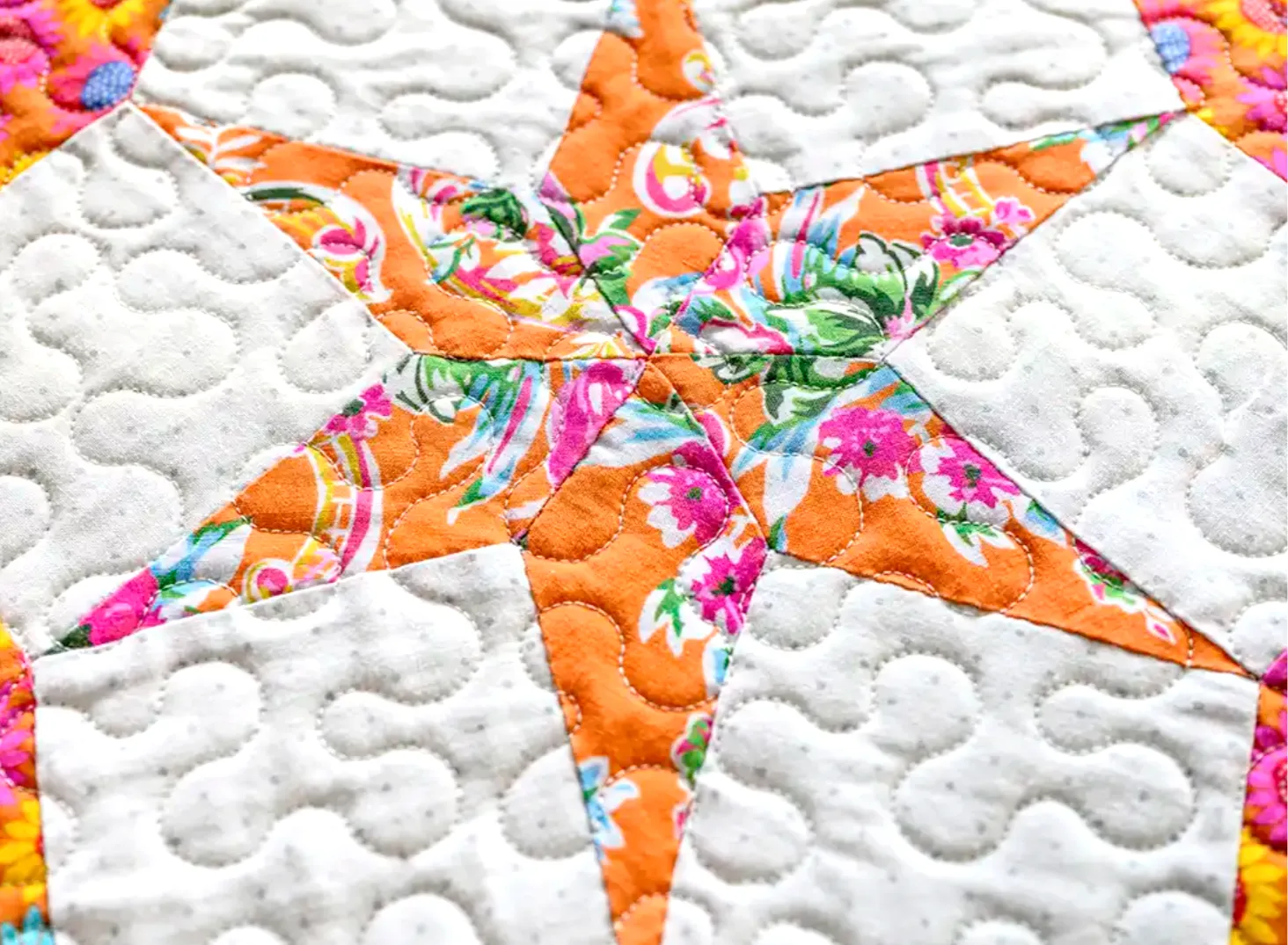 Carolyn Forster Meandering on her Patchwork Quilt
